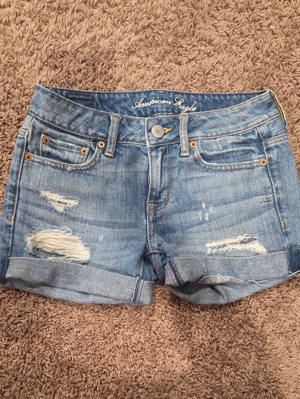 American Eagle Outfitters Distressed Light Blue Rolled-Hem Jean Shorts